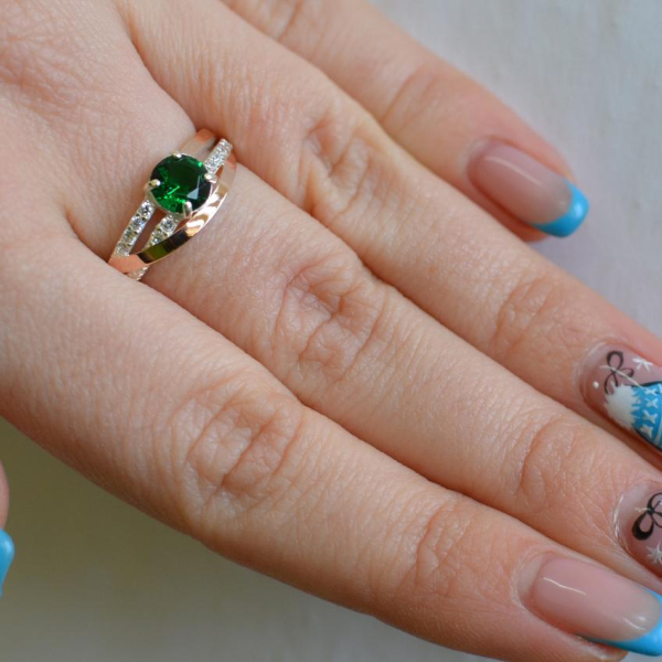 Срібне кільце з золотими вставками