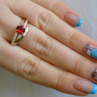 Срібне кільце з золотими вставками