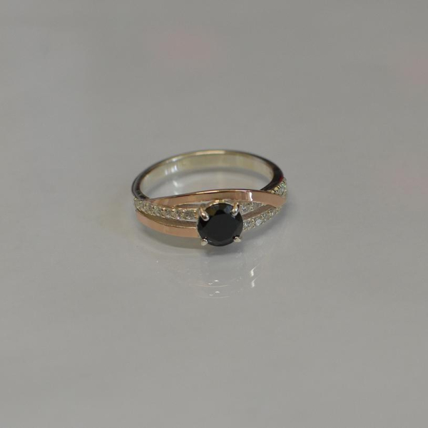 Срібне кільце з золотими вставками