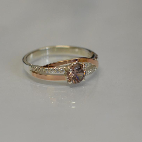 Срібне кільце з золотими вставками