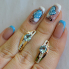 Срібні сережки з золотими вставками