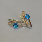 Срібні сережки з золотими вставками