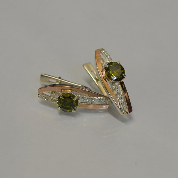 Срібні сережки з золотими вставками