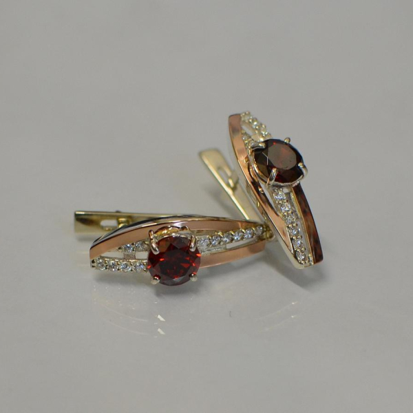 Срібні сережки з золотими вставками