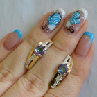 Срібні сережки з золотими вставками