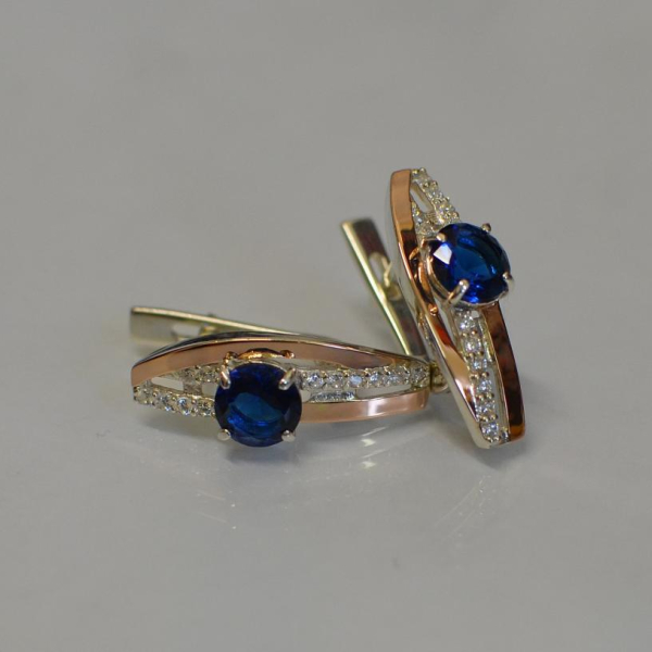 Срібні сережки з золотими вставками