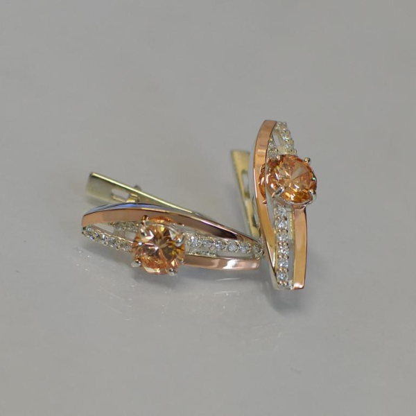 Срібні сережки з золотими вставками