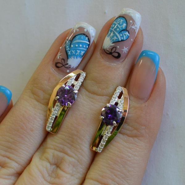 Срібні сережки з золотими вставками