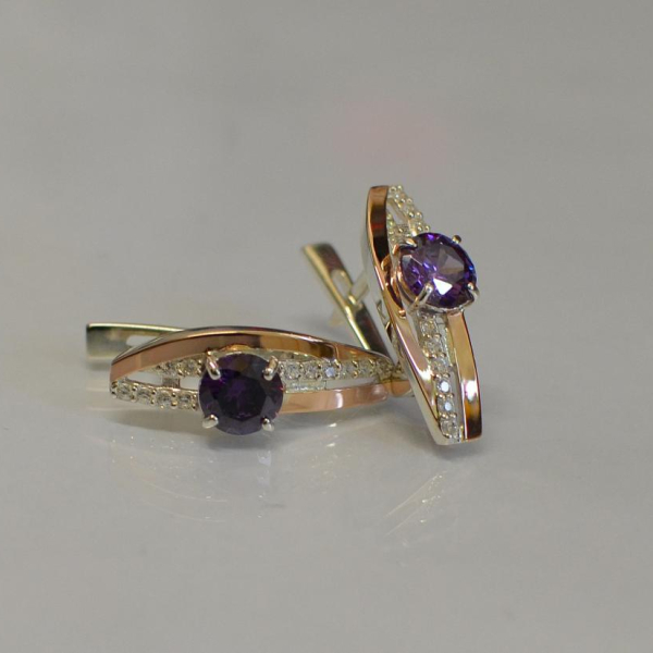 Срібні сережки з золотими вставками