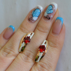 Срібні сережки з золотими вставками