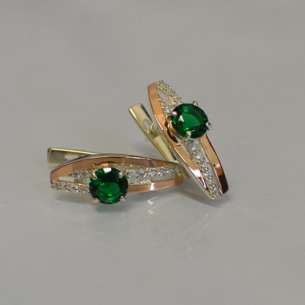 Срібні сережки з золотими вставками