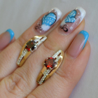 Срібні сережки з золотими вставками