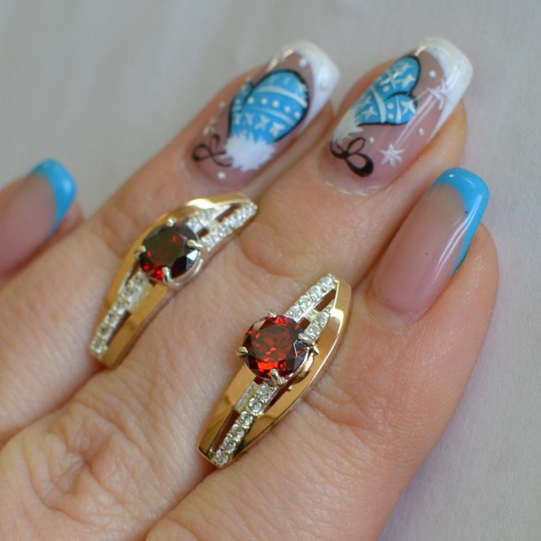 Срібні сережки з золотими вставками