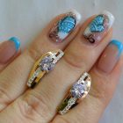 Срібні сережки з золотими вставками