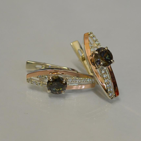 Срібні сережки з золотими вставками