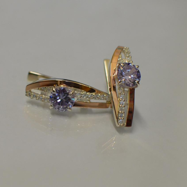 Срібні сережки з золотими вставками