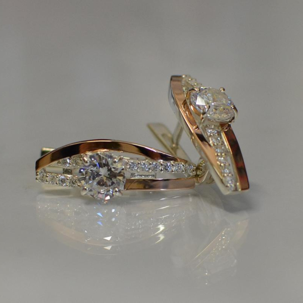 Срібні сережки з золотими вставками