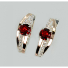 Срібні сережки з золотими вставками