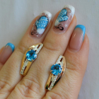 Срібні сережки з золотими вставками