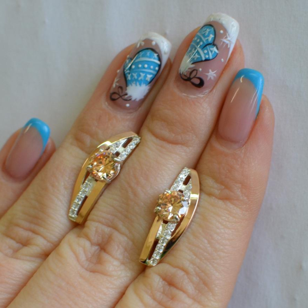 Срібні сережки з золотими вставками