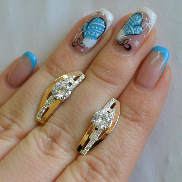 Срібні сережки з золотими вставками