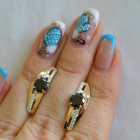 Срібні сережки з золотими вставками