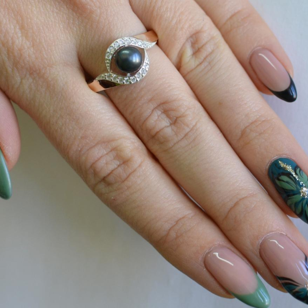 Срібна каблучка з золотоми вставками та перлиною