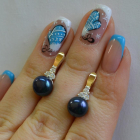 Срібні сережки з жемчугом