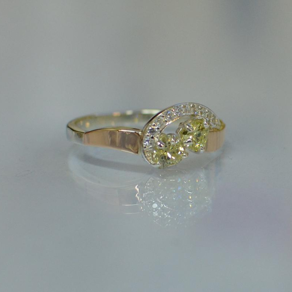 Срібна каблучка з серцями