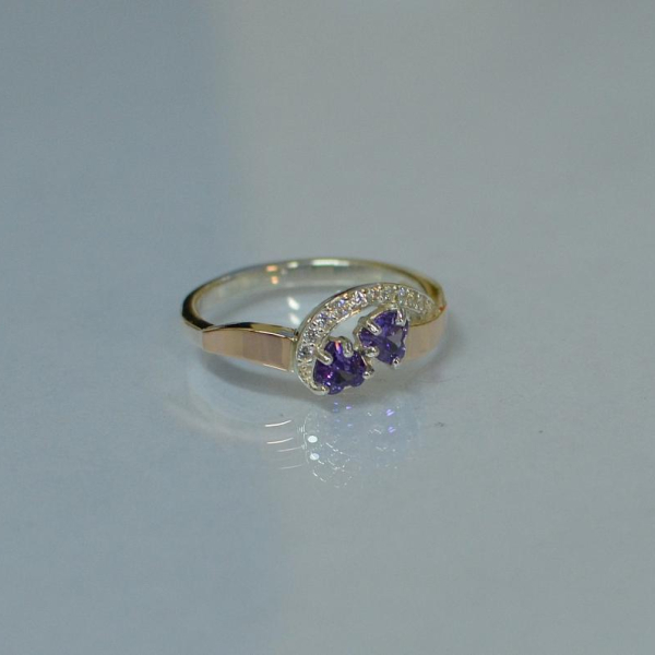 Срібна каблучка з серцями