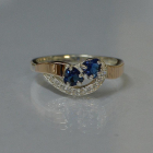 Срібна каблучка з серцями