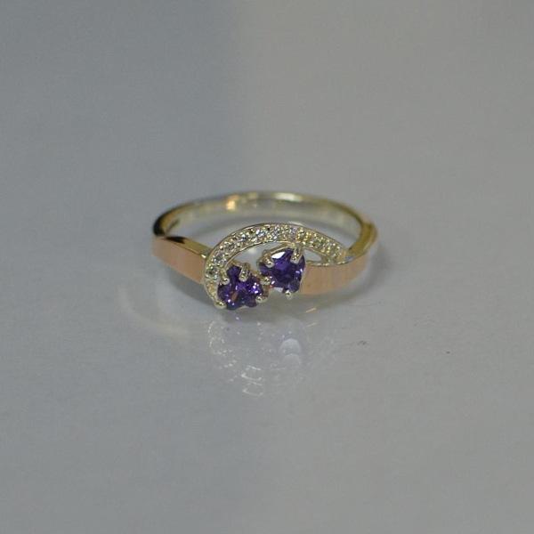 Срібна каблучка з серцями