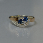 Срібна каблучка з серцями