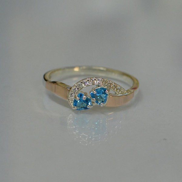 Срібна каблучка з серцями