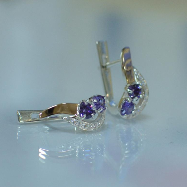 Срібні сережки з серцями