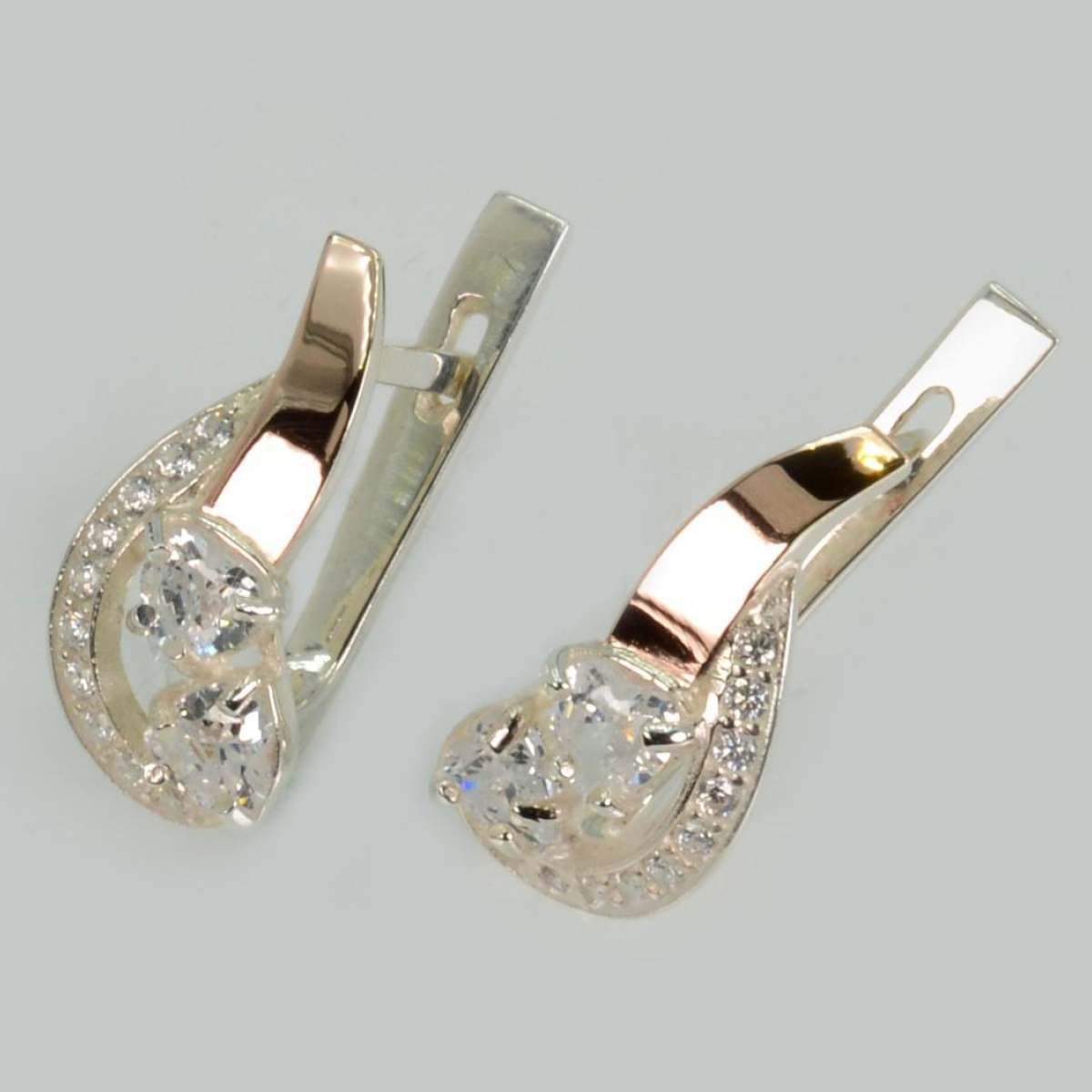 Срібні сережки з серцями