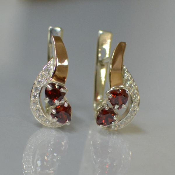 Срібні сережки з серцями