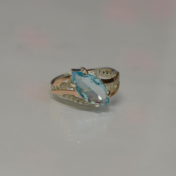 Срібна каблучка з золотими пластинами