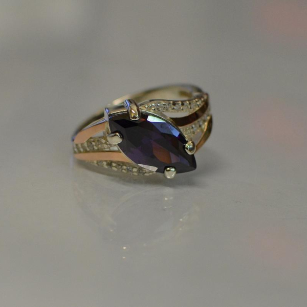 Срібна каблучка з золотими пластинами