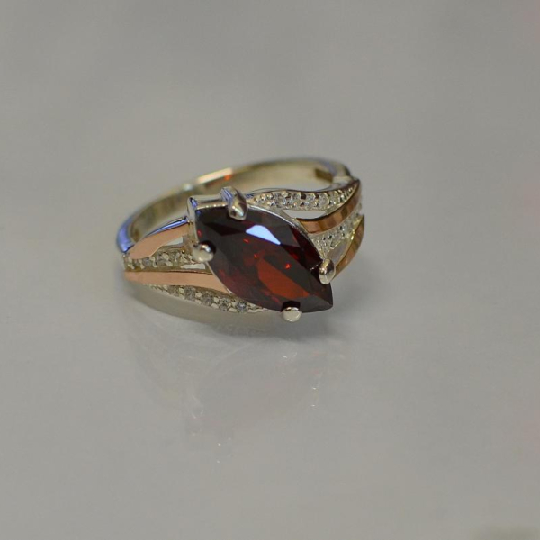 Срібна каблучка з золотими пластинами