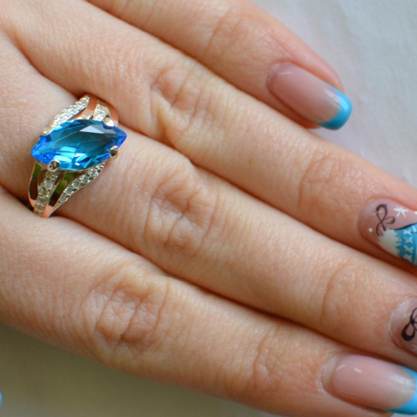 Срібна каблучка з золотими пластинами