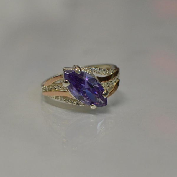 Срібна каблучка з золотими пластинами