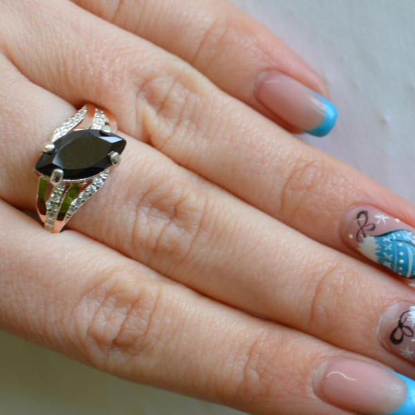 Срібна каблучка з золотими пластинами