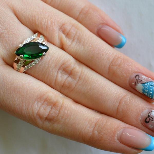 Срібна каблучка з золотими пластинами