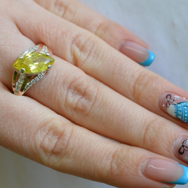 Срібна каблучка з золотими пластинами