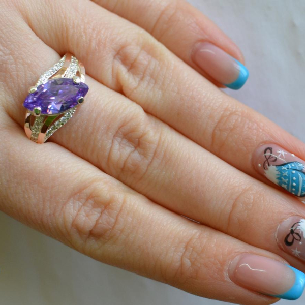 Срібна каблучка з золотими пластинами