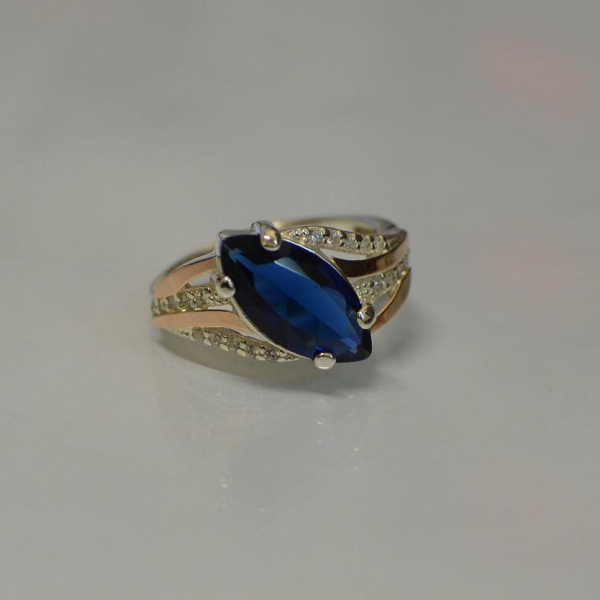 Срібна каблучка з золотими пластинами