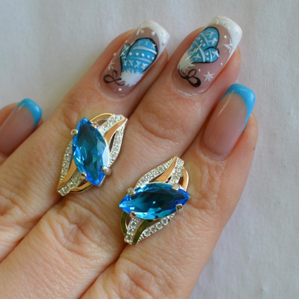 Срібні сережки з золотими пластинами