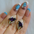 Срібні сережки з золотими пластинами