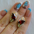 Срібні сережки з золотими пластинами